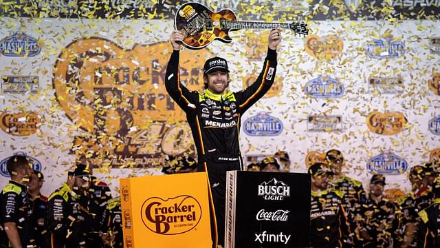 NASCAR Cup Series driver Ryan Blaney celebrates winning the Cracker Barrel 400 at Nashville Superspeedway in Lebanon, Tenn.