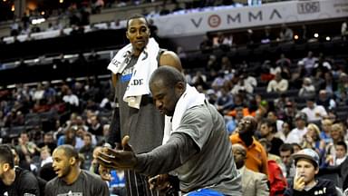Orlando Magic guard Jason Richardson (23) celebrates his team scoring as center Dwight Howard looks on during the game against the Charlotte Bobcats at Time Warner Cable Arena.