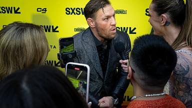 Conor McGregor speaks to press on the red carpet before the premiere of Roadhouse at the Paramount Theatre in Austin