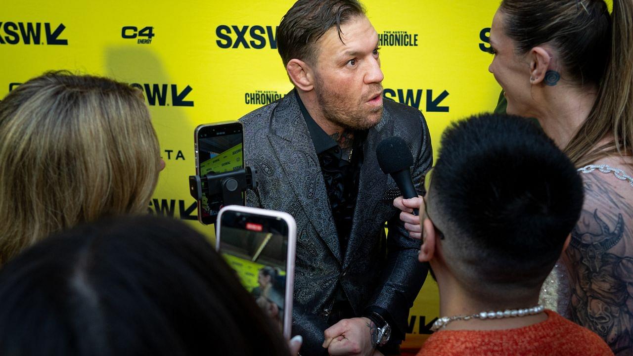 Conor McGregor speaks to press on the red carpet before the premiere of Roadhouse at the Paramount Theatre in Austin