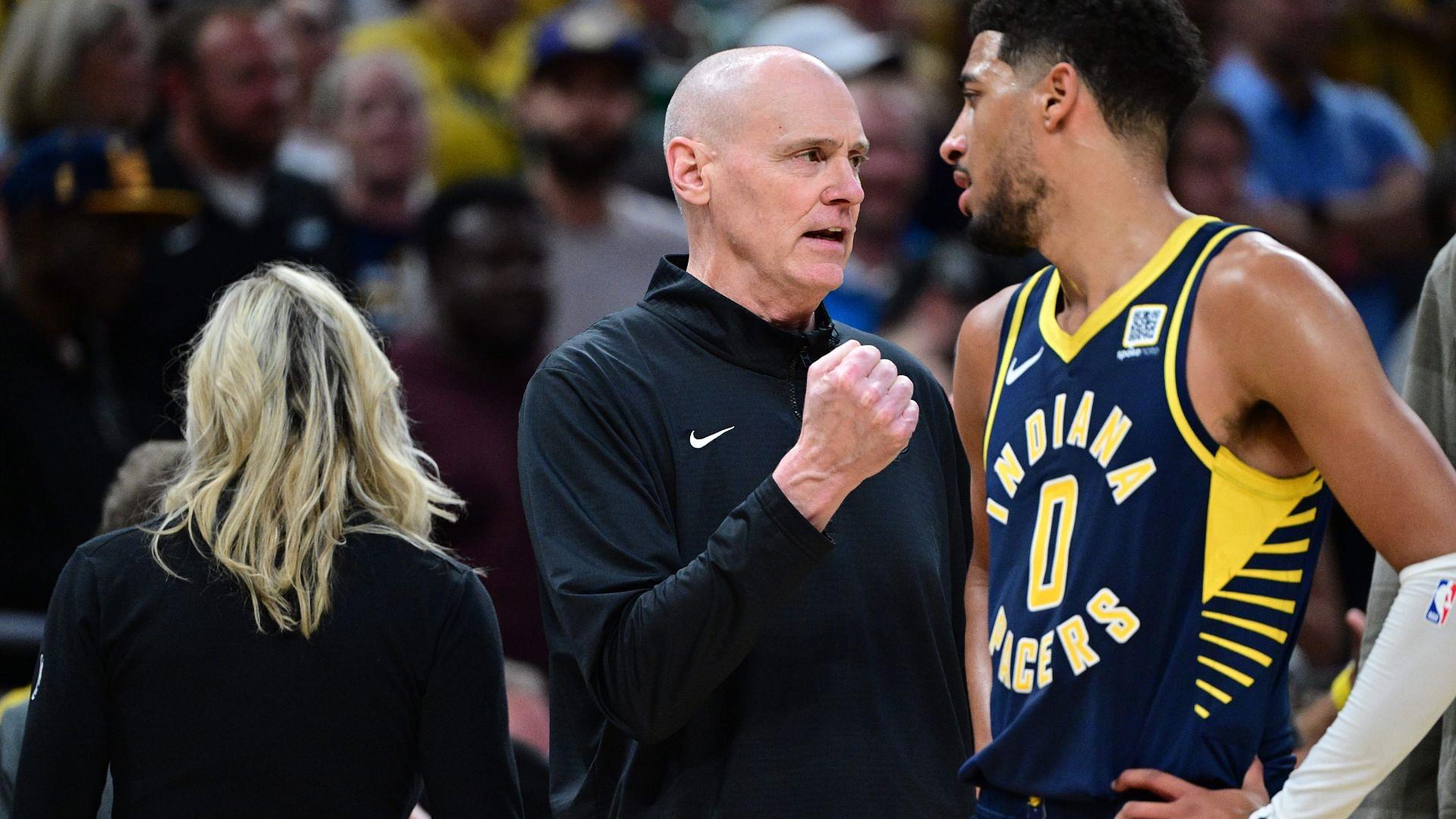 Oct 30, 2024; Indianapolis, Indiana, USA; Indiana Pacers Head Coach Rick Carlisle shares a moment with Indiana Pacers guard Tyrese Haliburton (0) during overtime at Gainbridge Fieldhouse.