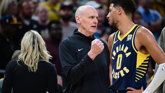 Oct 30, 2024; Indianapolis, Indiana, USA; Indiana Pacers Head Coach Rick Carlisle shares a moment with Indiana Pacers guard Tyrese Haliburton (0) during overtime at Gainbridge Fieldhouse.