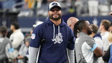 Dallas Cowboys quarterback Dak Prescott (left) stands on crutches before the game against the New York Giants at AT&T Stadium.