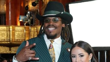 Apr 25, 2024; Detroit, MI, USA; Former NFL quarterback Cam Newton and broadcaster Kaylee Hartung pose for a photograph on the red carpet ahead of the 2024 NFL Draft at Detroit’s Fox Theatre.