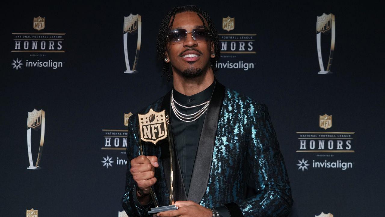 Washington Commanders quarterback Jayden Daniels poses with the Offensive Rookie of the Year award during Super Bowl LIX NFL Honors at Saenger Theatre.