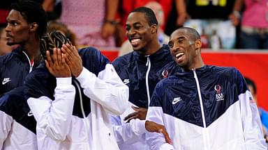 Aug 24, 2008; Beijing, CHINA; USA guard Kobe Bryant (left) jokes around with teammates Carmelo Anthony (left) and Dwight Howard (center) as they wait to be presented with his gold medal for beating Spain in the mens basketball gold medal game at the Beijing Olympic Basketball Gymnasium during the 2008 Beijing Olympic Games. USA beat Spain 118-107 to win the gold medal. Mandatory Credit: Bob Donnan-Imagn Images
