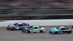 NASCAR Cup Series drivers Shane van Gisbergen (88) Brad Keselowski (6) and driver Bubba Wallace (23) race down the main straightaway during stage three of the FireKeepers Casino 400 at Michigan International Speedway.