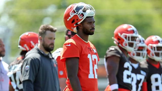 Cleveland Browns quarterback Shedeur Sanders (12) watches from the sideline during day two of NFL rookie minicamp at the Cleveland Browns training facility on Saturday, May 10, 2025, in Berea, Ohio.