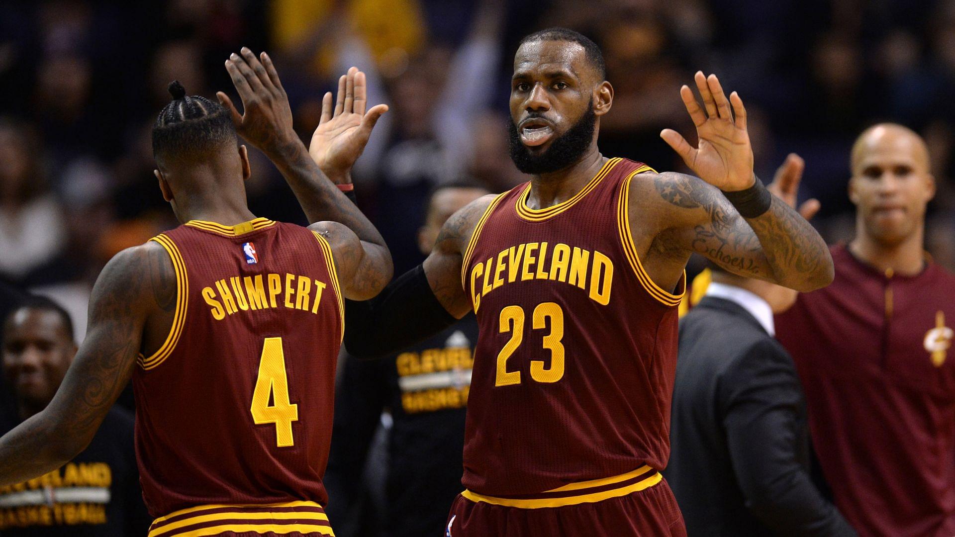 Jan 8, 2017; Phoenix, AZ, USA; Cleveland Cavaliers forward LeBron James (23) slaps hands with Cleveland Cavaliers guard Iman Shumpert (4) during the first half against the Phoenix Suns at Talking Stick Resort Arena.