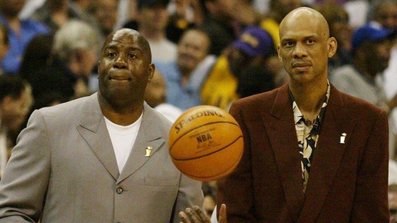 Past Lakers greats Magic Johnson and Kareem Abdul Jabar share mid court for pre-game ceremonies prior to the start of Game 1 of the NBA Basketball Herren USA Finals between the Detroit Pistons and Los Angeles Lakers at the Staples Center in Los Angeles, California, on June 6, 2004.