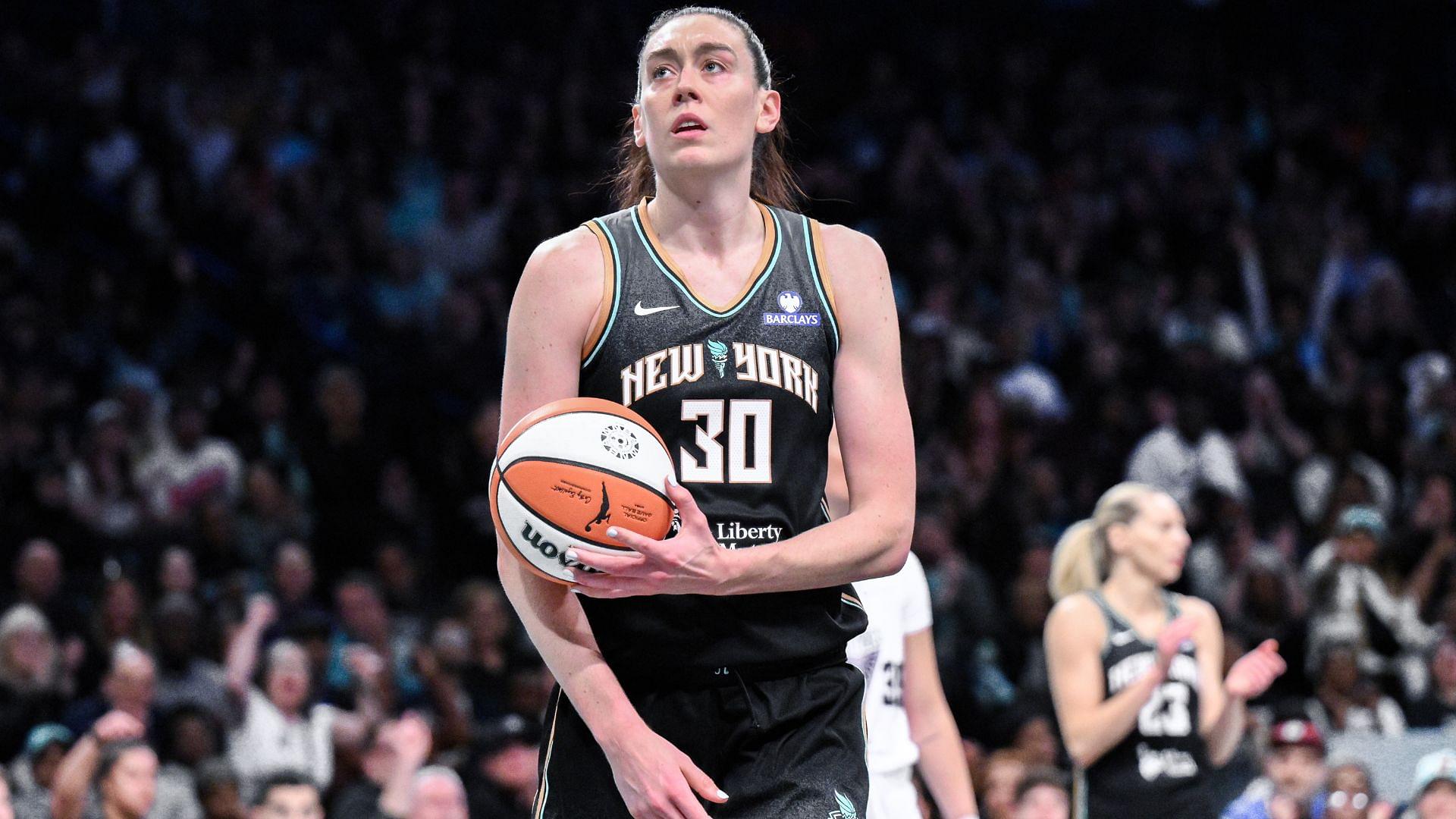 May 29, 2025; Brooklyn, New York, USA; New York Liberty forward Breanna Stewart (30) reacts after scoring a basket against the Golden State Valkyries during the second half at Barclays Center.