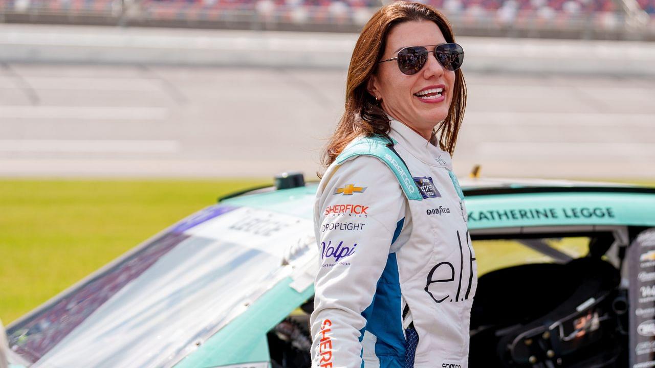 Xfinity Series driver Katherine Legge (32) speaks with fans before the race at Talladega Superspeedway.