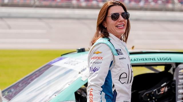 Xfinity Series driver Katherine Legge (32) speaks with fans before the race at Talladega Superspeedway.