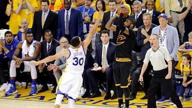 Cleveland Cavaliers guard Kyrie Irving (2) shoots the the game winning shot during the fourth quarter against Golden State Warriors guard Stephen Curry (30) in game seven of the NBA Finals at Oracle Arena.