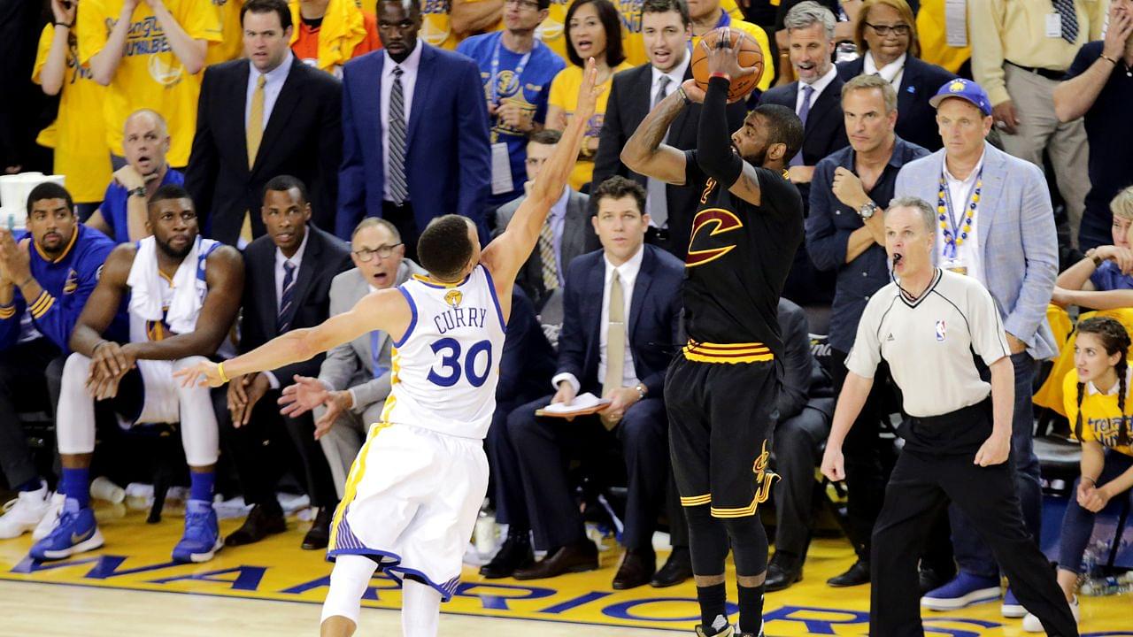 Cleveland Cavaliers guard Kyrie Irving (2) shoots the the game winning shot during the fourth quarter against Golden State Warriors guard Stephen Curry (30) in game seven of the NBA Finals at Oracle Arena.