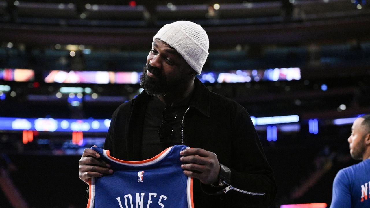 UFC mixed martial arts heavyweight champion Jon Jones poses for a photo before a game between the New York Knicks and the Chicago Bulls at Madison Square Garden.