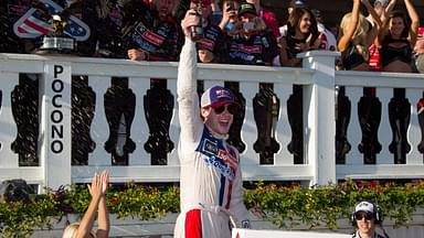 NASCAR Cup Series driver Ryan Blaney celebrates in victory lane after winning the Pocono 400 at Pocono Raceway.
