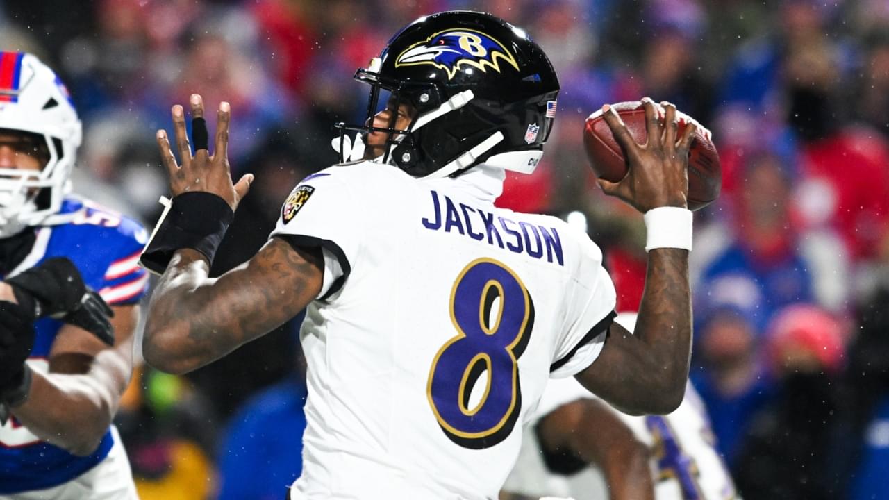 Jan 19, 2025; Orchard Park, New York, USA; Baltimore Ravens quarterback Lamar Jackson (8) throws the ball during the fourth quarter against the Buffalo Bills in a 2025 AFC divisional round game at Highmark Stadium. Mandatory Credit: Mark Konezny-Imagn Images