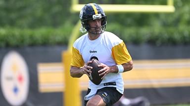 Pittsburgh Steelers quarterback Aaron Rodgers (8) drops back to pass during minicamp at their South Side facility.