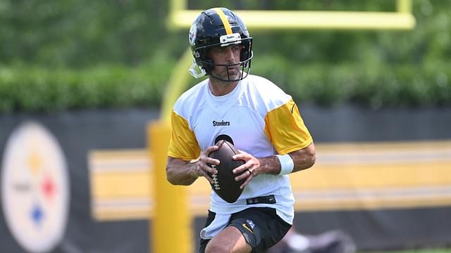 Pittsburgh Steelers quarterback Aaron Rodgers (8) drops back to pass during minicamp at their South Side facility.