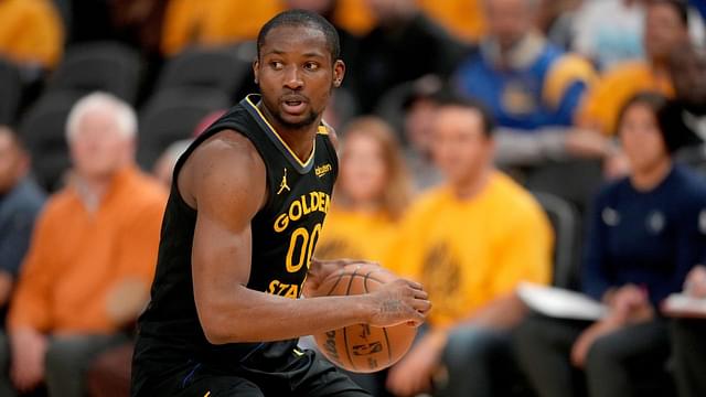; Golden State Warriors forward Jonathan Kuminga (00) holds onto the ball against the Minnesota Timberwolves in the fourth quarter during game four of the second round for the 2025 NBA Playoffs at Chase Center.