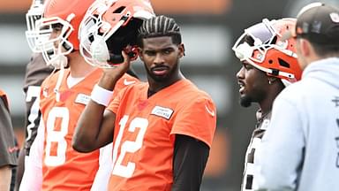 Cleveland Browns quarterback Shedeur Sanders (12) listens to a play call during mini camp at CrossCountry Mortgage Campus.