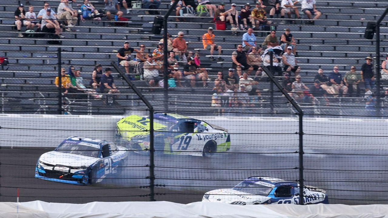 NASCAR Xfinity Series driver Austin Hill (21) and NASCAR Xfinity Series driver Aric Almirola (19) collide Saturday, July 26, 2025, during the Pennzoil 250 at Indianapolis Motor Speedway.