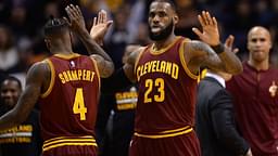 Jan 8, 2017; Phoenix, AZ, USA; Cleveland Cavaliers forward LeBron James (23) slaps hands with Cleveland Cavaliers guard Iman Shumpert (4) during the first half against the Phoenix Suns at Talking Stick Resort Arena.