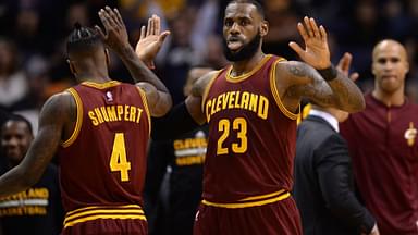 Jan 8, 2017; Phoenix, AZ, USA; Cleveland Cavaliers forward LeBron James (23) slaps hands with Cleveland Cavaliers guard Iman Shumpert (4) during the first half against the Phoenix Suns at Talking Stick Resort Arena.
