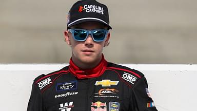 NASCAR Xfinity Series driver Connor Zilisch stands on pit road prior to the BetRivers 200 at Dover Motor Speedway.