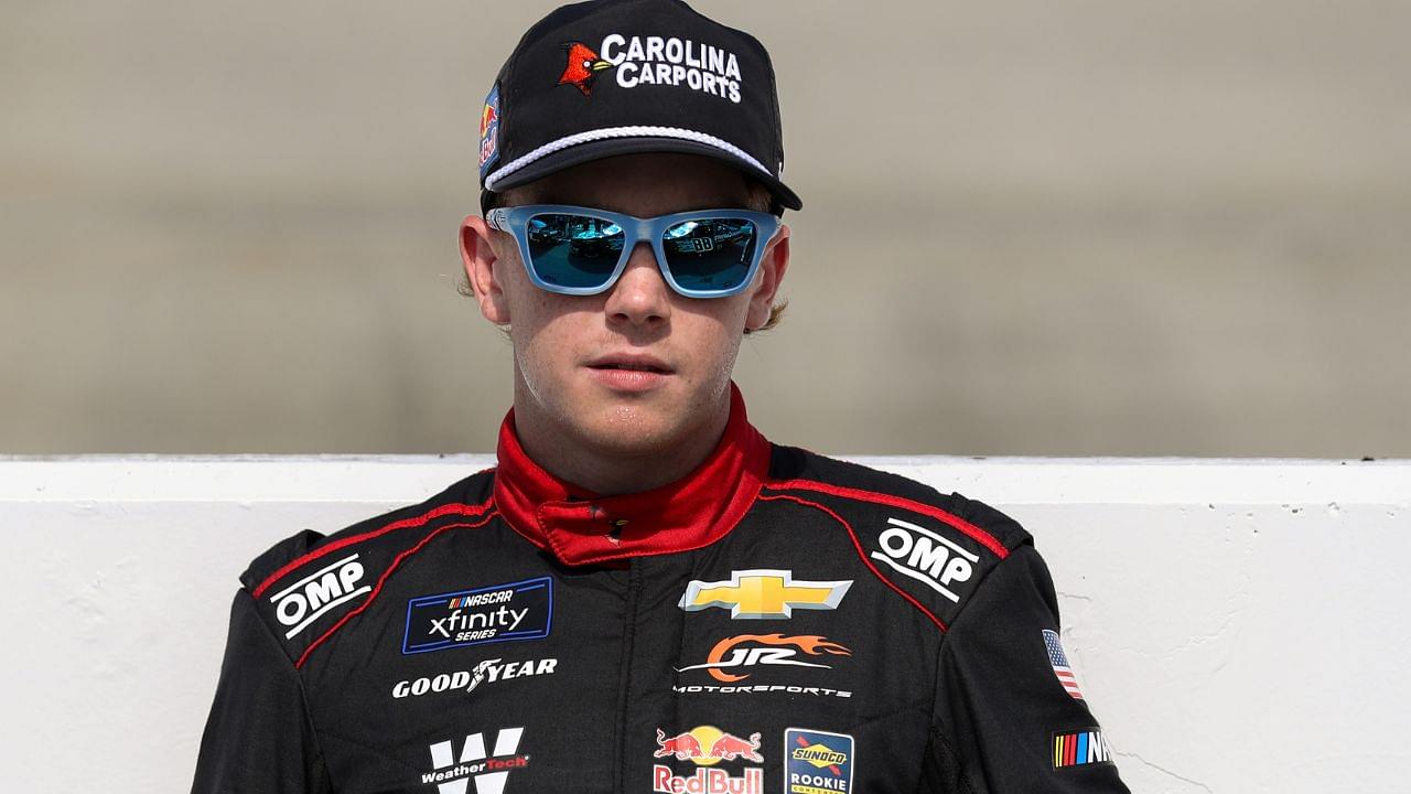 NASCAR Xfinity Series driver Connor Zilisch stands on pit road prior to the BetRivers 200 at Dover Motor Speedway.