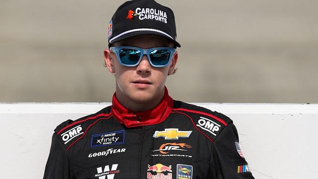 NASCAR Xfinity Series driver Connor Zilisch stands on pit road prior to the BetRivers 200 at Dover Motor Speedway.