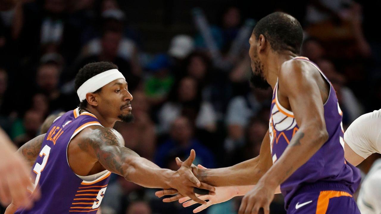 Phoenix Suns guard Bradley Beal (3) celebrates his basket against the Minnesota Timberwolves with forward Kevin Durant (35) in the fourth quarter at Target Center.