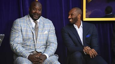 Los Angeles Lakers former center Shaquille O'Neal (left) and guard Kobe Bryant react during ceremony to unveil statue of O'Neal at Staples Center.