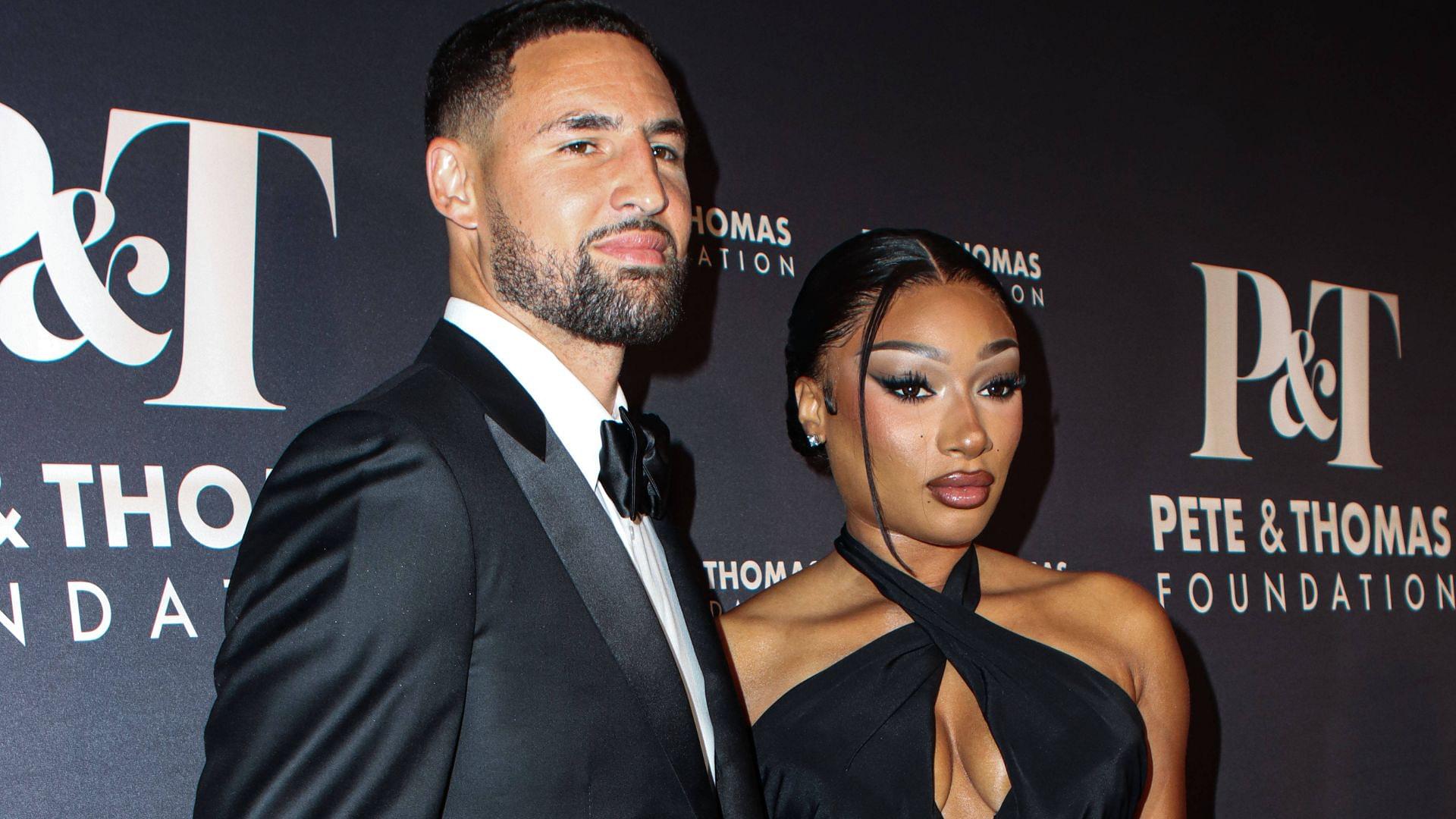 Inaugural Megan Thee Stallion s Pete And Thomas Foundation Gala Klay Thompson and girlfriend Megan Thee Stallion (Megan Jovon Ruth Pete) wearing Off-White arrive at the Inaugural Megan Thee Stallion s Pete And Thomas Foundation Gala held at Gotham Hall at The Haier Building in Manhattan, New York City, New York,