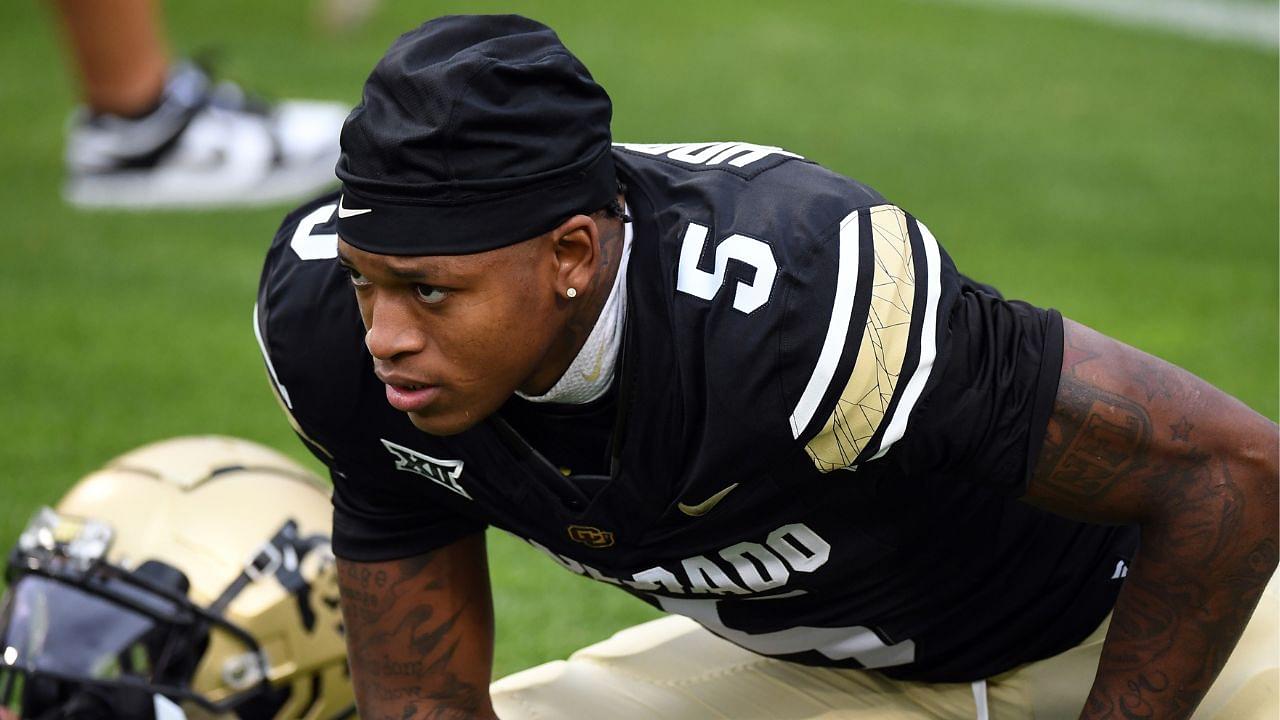 Colorado Buffaloes wide receiver Jimmy Horn Jr. (5) stretches before the game against the Baylor Bears at Folsom Field.