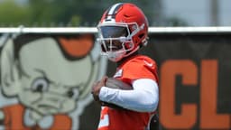 Browns quarterback Shedeur Sanders celebrates after breaking away for a big gain during practice, Wednesday, June 11, 2025, in Berea.