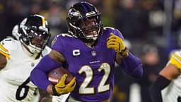 Jan 11, 2025; Baltimore, Maryland, USA; Baltimore Ravens running back Derrick Henry (22) runs to score a touchdown against the Pittsburgh Steelers in the third quarter in an AFC wild card game at M&T Bank Stadium.