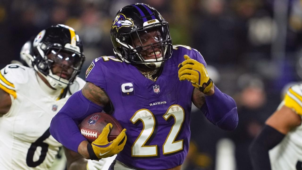 Jan 11, 2025; Baltimore, Maryland, USA; Baltimore Ravens running back Derrick Henry (22) runs to score a touchdown against the Pittsburgh Steelers in the third quarter in an AFC wild card game at M&T Bank Stadium.