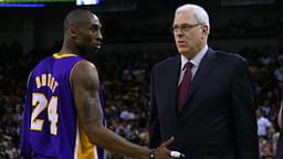 Los Angeles Lakers shooting guard Kobe Bryant (24) talks to head coach Phil Jackson (right) during the second quarter against the Golden State Warriors at ORACLE Arena.