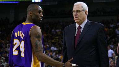 Los Angeles Lakers shooting guard Kobe Bryant (24) talks to head coach Phil Jackson (right) during the second quarter against the Golden State Warriors at ORACLE Arena.