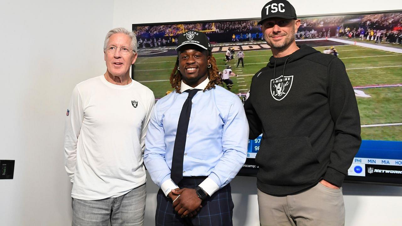 Las Vegas Raiders head coach Pete Carroll, Ashton Jeanty and general manager John Spytek pose after a news conference introducing Jeanty as the first round draft pick in the 2025 NFL Draft at Intermountain Health Performance Center.