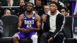 Apr 7, 2023; Milwaukee, Wisconsin, USA; Milwaukee Bucks forward Giannis Antetokounmpo (34) sits with his brother forward Thanasis Antetokounmpo (43) in the fourth quarter during game against the Memphis Grizzlies at Fiserv Forum.