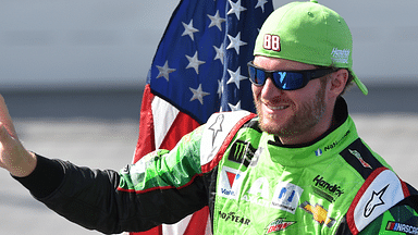 Oct 15, 2017; Talladega, AL, USA; Monster Energy NASCAR Cup Series driver Dale Earnhardt Jr. (88) waves as he is introduced before the Alabama 500 at Talladega Superspeedway. Mandatory Credit: Glenn Andrews-Imagn Images