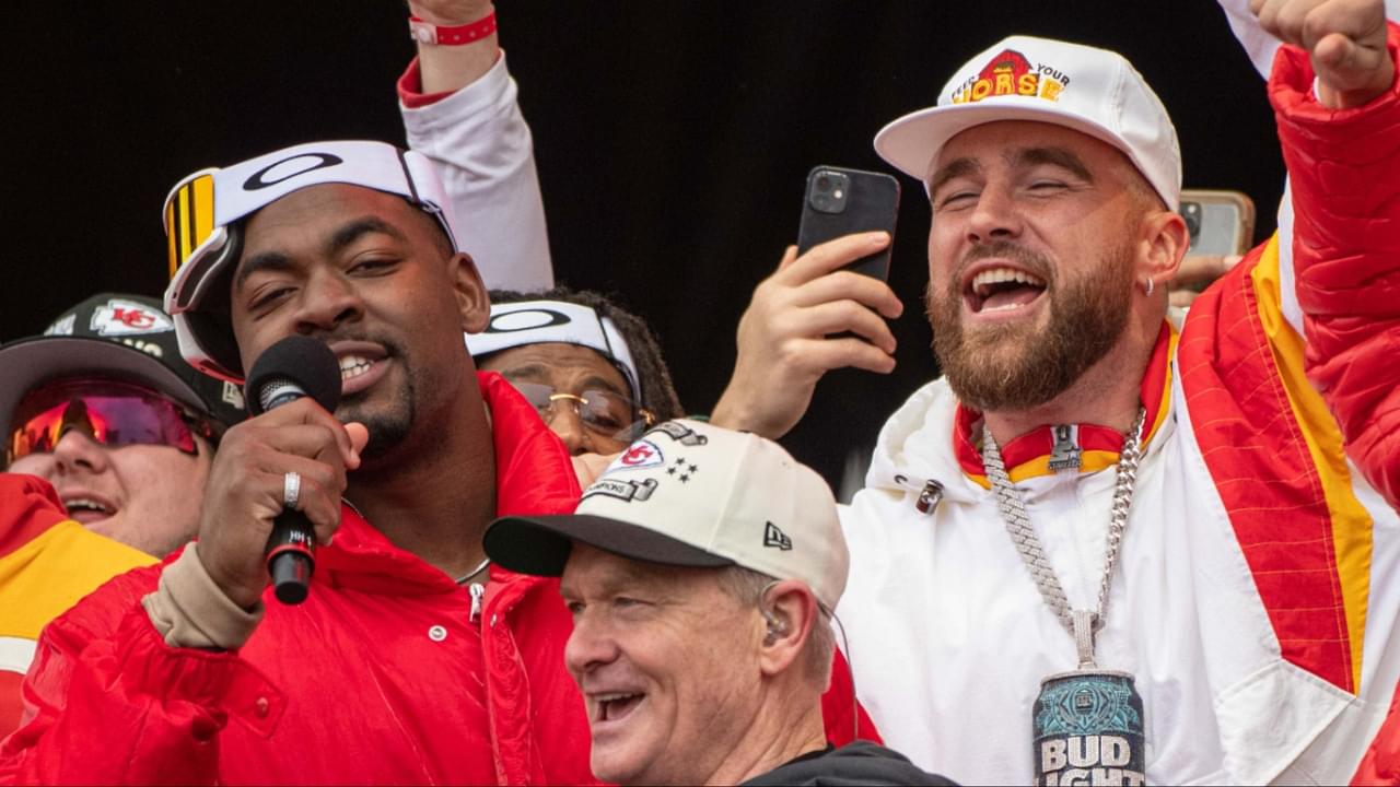 Kansas City Chiefs defensive tackle Chris Jones speaks next to tight end Travis Kelce and quarterback Patrick Mahomes II at the Super Bowl LVII Champions Parade in downtown Kansas City, Mo.