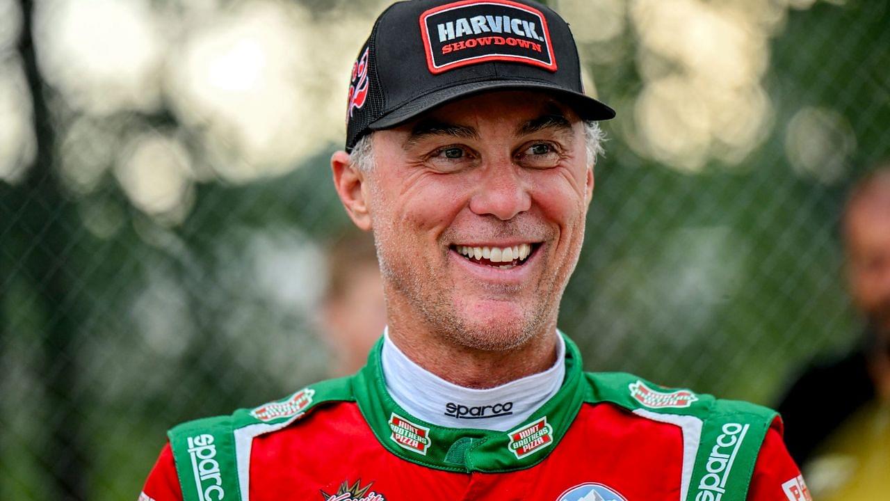 Former NASCAR Cup Series champion Kevin Harvick smiles during an autograph session before the 13th annual Masters of the Pros 200 race on Wednesday, July 16, 2025, at the Owosso Speedway. Harvick and his 13-year-old son Keelan competed against each other in the race later in the night.
