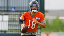 Chicago Bears quarterback Caleb Williams (18) runs with the ball during training camp at Halas Hall.