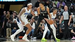 San Antonio Spurs center Victor Wembanyama (1) looks to pass in front of Orlando Magic forward Paolo Banchero (5) in the second half at Frost Bank Center.