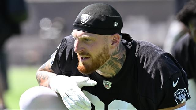 Las Vegas Raiders defensive end Maxx Crosby (98) looks on during the team stretch during Las Vegas Raiders Minicamp at Intermountain Health Performance Center.
