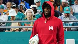 Los Angeles Clippers guard John Wall watches the game between the Miami Dolphins and the Dallas Cowboys during the first half at Hard Rock Stadium.